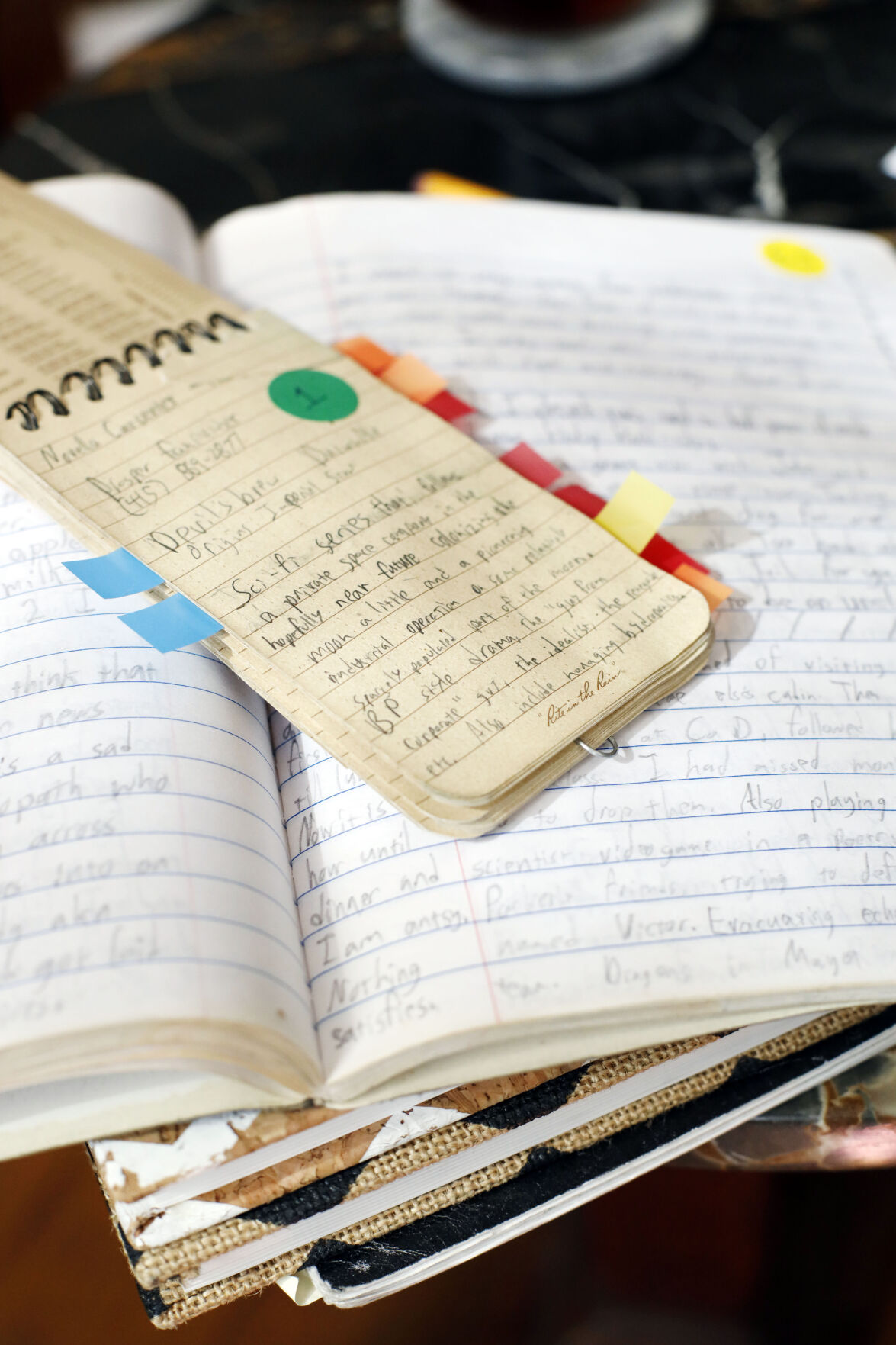 pile of notebooks and journals written by Milo Imrie